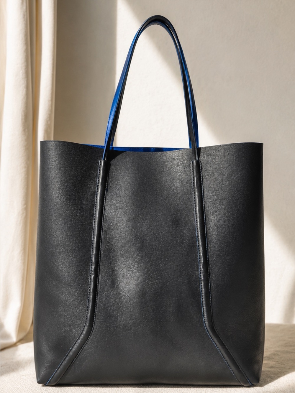 Minimalist Black Leather-Look Tote Bag with Cobalt Blue Interior - Picture 2 of 8